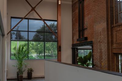 Crane room windows with exposed steel cross bracing